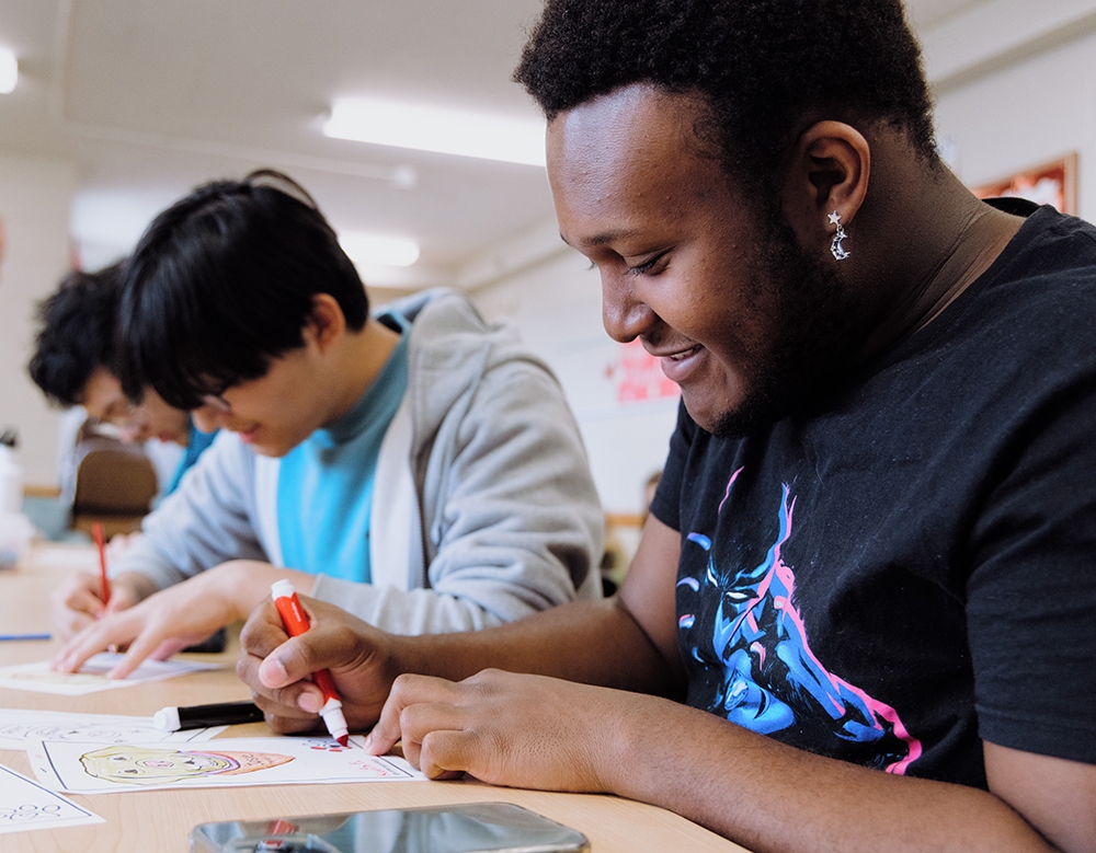Srudents at Dogs and Donuts coloring event